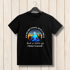 Black t-shirt with a graphic design and text on a wooden background