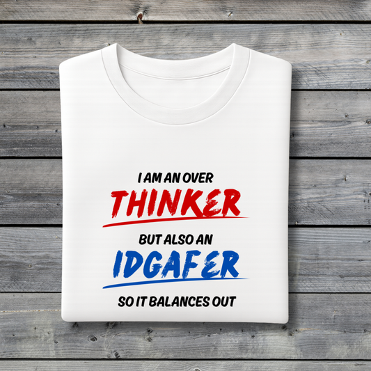 White t-shirt with humorous text design on a wooden background