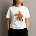 Person wearing a white t-shirt with a colorful design and text on a plain background