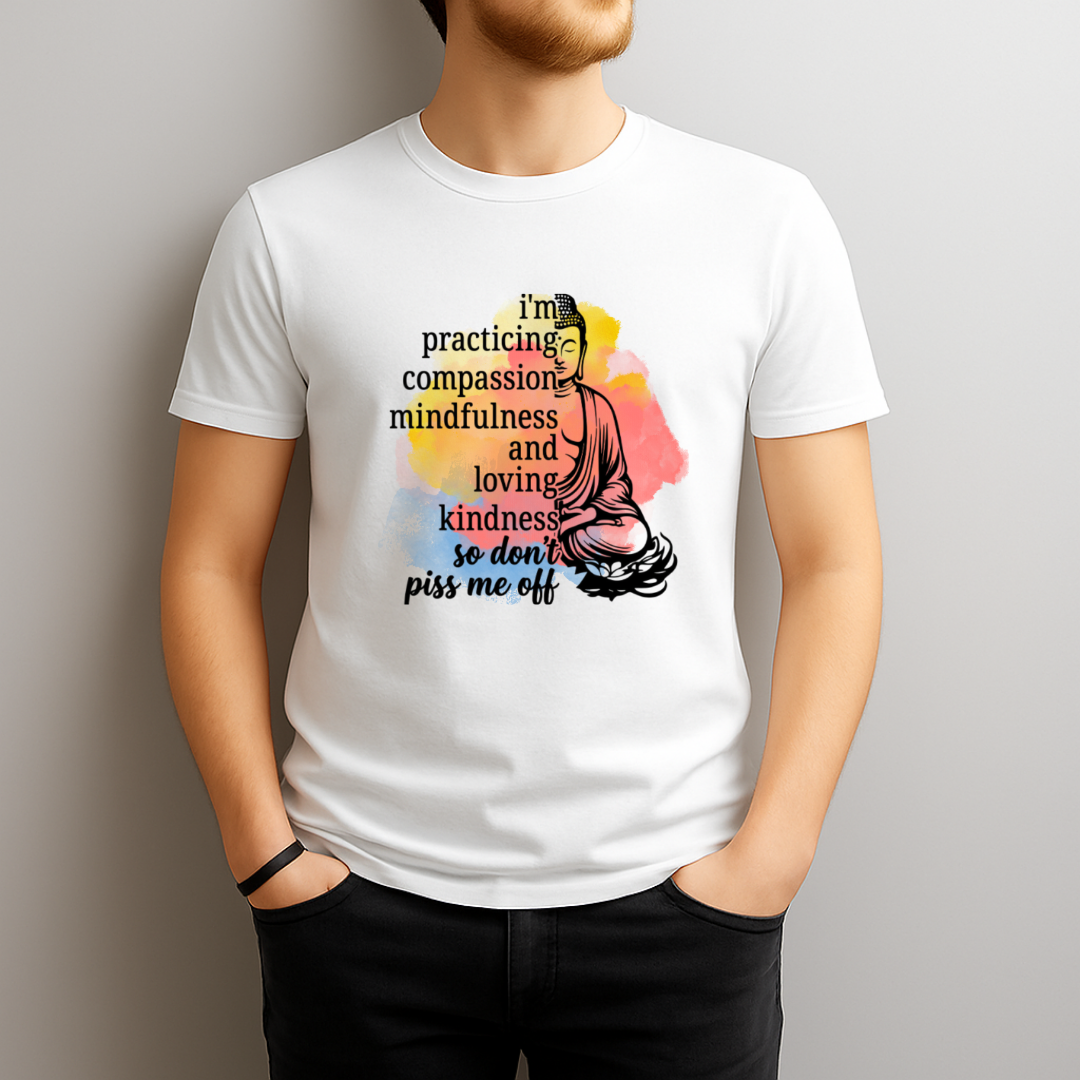 Person wearing a white t-shirt with a Buddha graphic and text on a plain background
