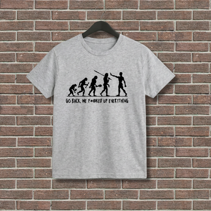 Gray t-shirt with a graphic design and text on a brick wall background