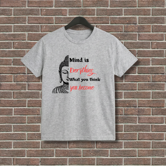Gray t-shirt with Buddha graphic and motivational quote on a brick wall background