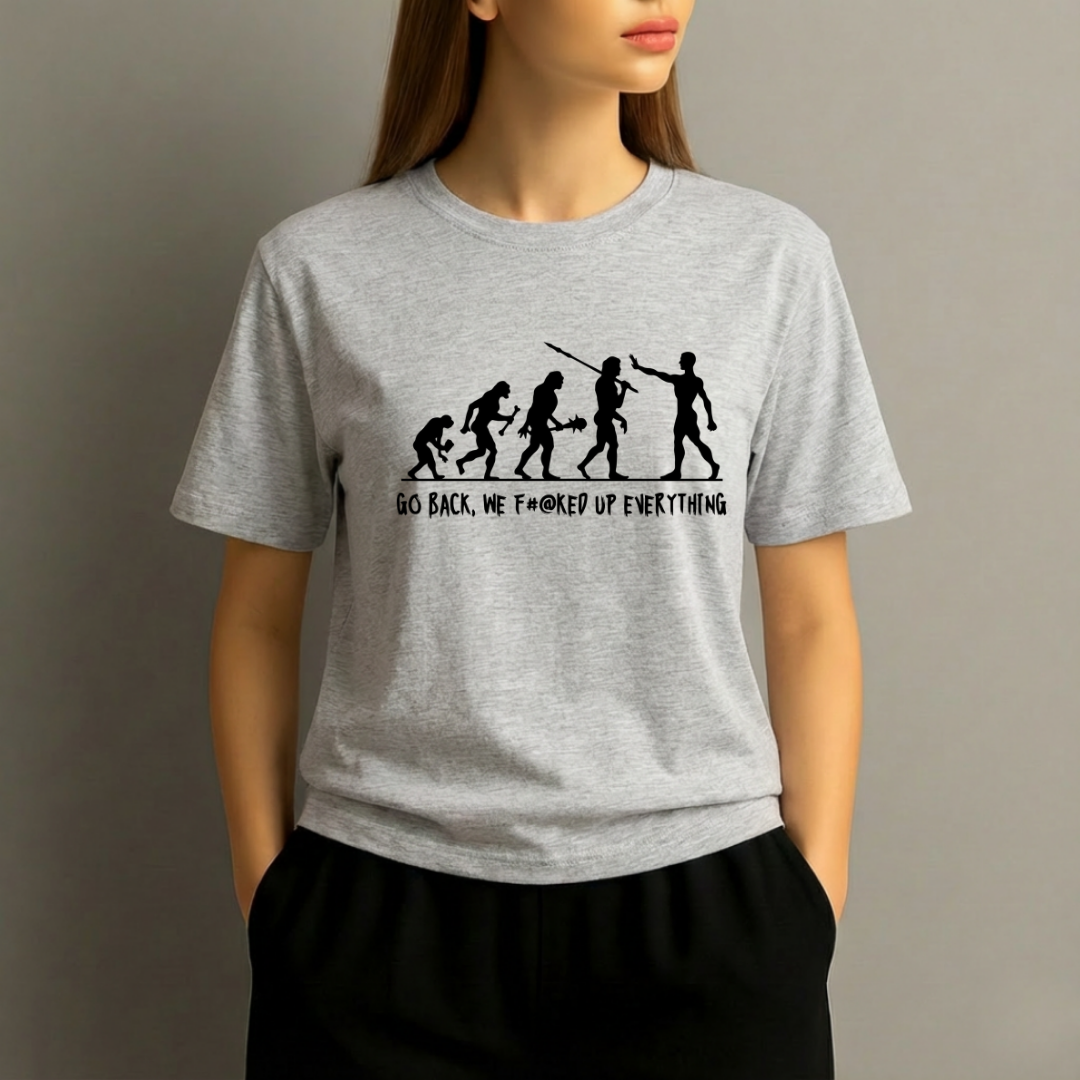 Person wearing a gray t-shirt with a graphic design and text on a plain background