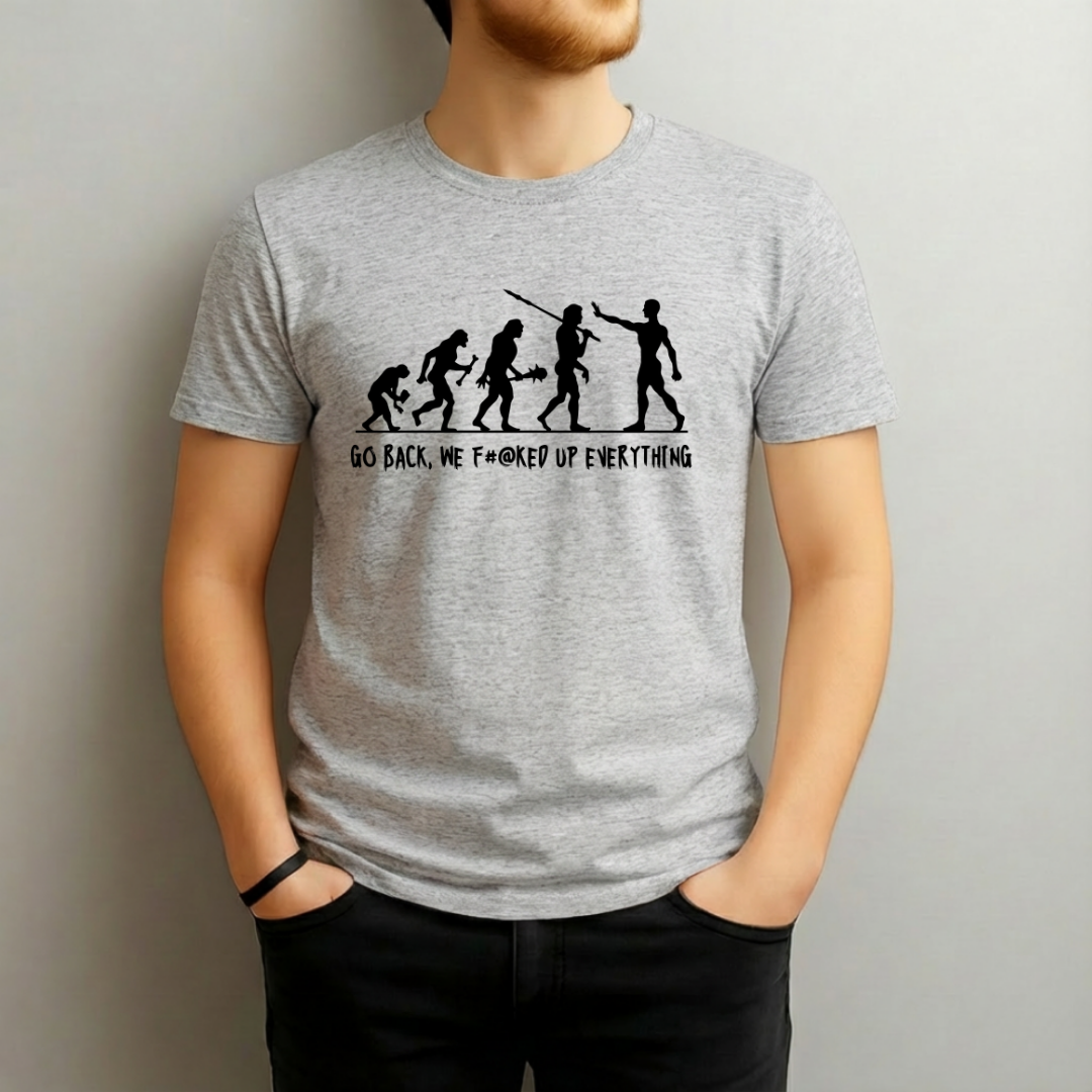 Person wearing a gray t-shirt with a graphic design and text.
