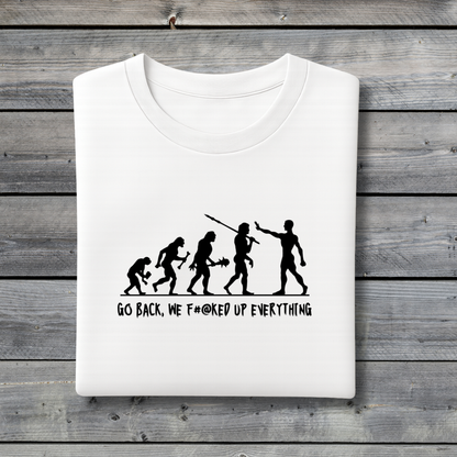 White t-shirt with black graphic and text on a wooden surface